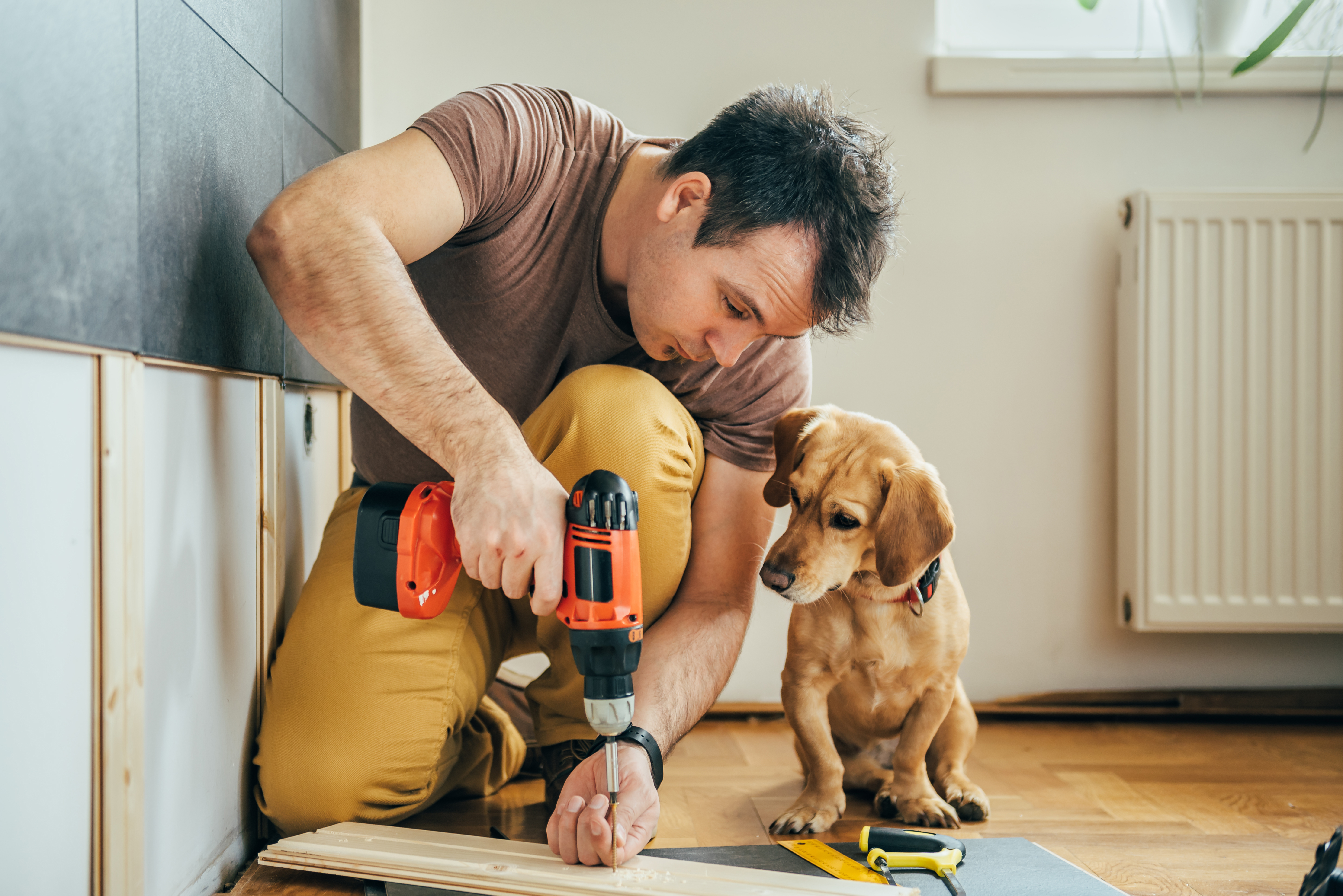 Man working on his house